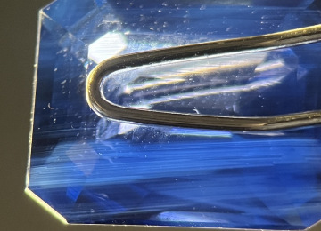 Fine-grained-milky-banding-in-a-sapphire