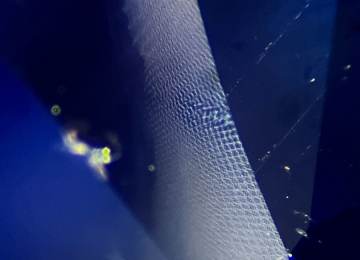 Fine-moire-fingerprint-in-a-sapphire-showing-a-mesh-like-appearance