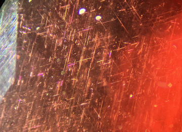 Fine-needles-of-intersecting-rutile-in-a-ruby