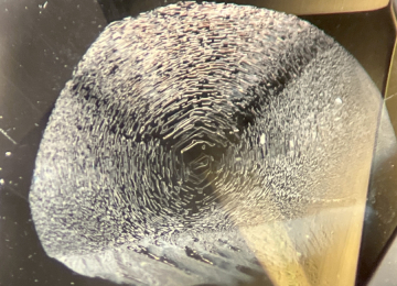 Fingerprint-in-a-yellow-sapphire-showing-a-hexgonal-core