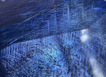 Hay-like-intersecting-rutile-in-a-sapphire
