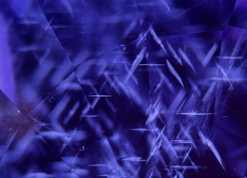 Intersecting-crystographically-alligned-rhombic-platelets-in-a-pink-sapphire
