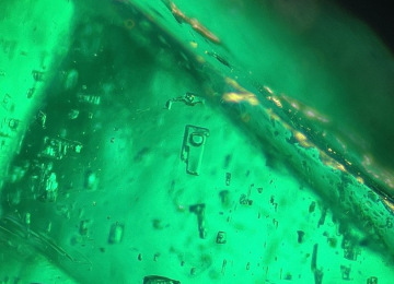 Irregular-blocky-two-phase-inclusions-in-a-suspected-Zambian-emerald