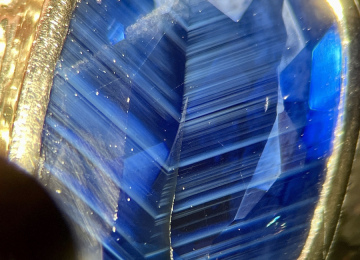 Sharp-milky-angular-zoning-in-a-basalt-hosted-sapphire