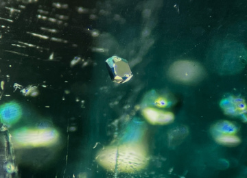 Small-crystal-possibly-pyrite-in-a-Colombian-emerald
