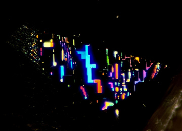 Strong-neon-like-interference-colours-seen-on-a-rectilinear-fingerprint-in-a-Sri-Lankan-sapphire-2